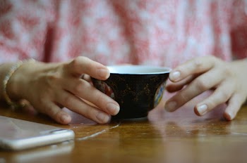 Shallow Focus Photography of Black Ceramic Cup