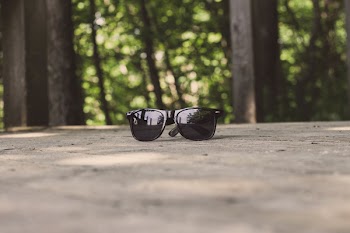 Shallow Focus Photography of Black Sunglasses