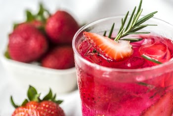 Shallow Focus Photography of Glass Filled With Strawberry Juice