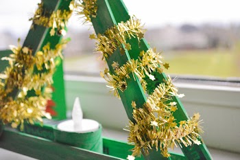 Shallow Focus Photography of Green and Yellow Candle Holder With White Candle