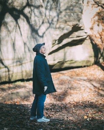Shallow Focus Photography of Person in Black Coat