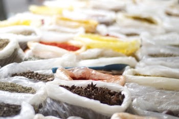 Shallow Focus Photography Of Plastic Packs