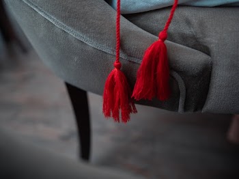 Shallow Focus Photography Of Red Tassels