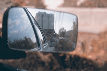 Shallow Focus Photography of Side Mirror