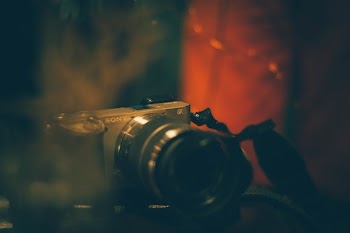 Shallow Focus Photography of Sony Dslr Camera on Table