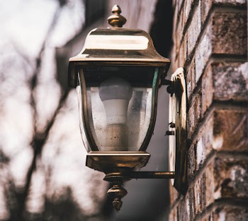Shallow Focus Photography of Wall Sconce
