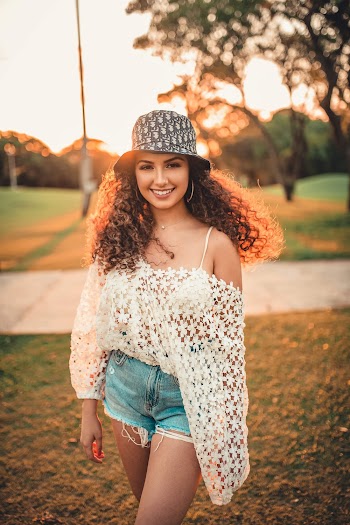 Shallow Focus Photography of Woman Wearing Bucket Hat