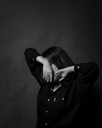 She could suddenly become a whole other character. A second ago she was laughing and then she decided to go deep into thoughts ... like her soul started a very slow dance, her hands were floating in air, she closed her eyes and ... I shot the moment she suddenly impressed me. Not much have changed in this photo. I'm not fan of extreme editing even though I sometimes try them. I decided not to even remove her hair from her hands because to me this is what made her original.