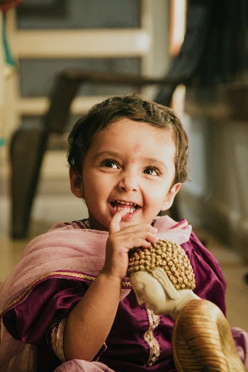 She is very fond of buddha’s statues so she is our little buddha.