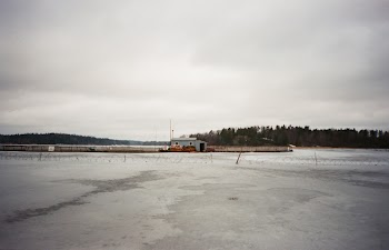 Shed at the Center of Dried Up Body of Water
