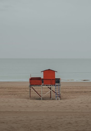 Shed on Beach during Overcast · Free Stock Photo