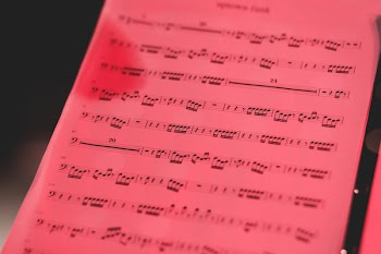 Sheet music in red light