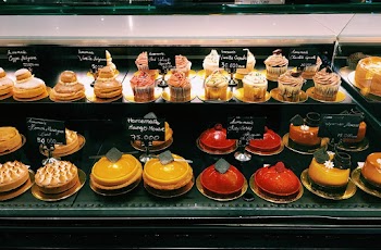 Shelves of Assorted Cake in a Bakeshop