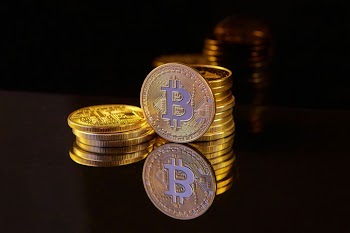 Shiny Bitcoin Coins with Reflection
