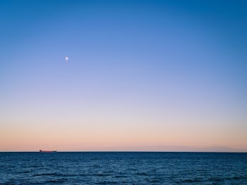 Ship Vessel in Sea during Golden Hour