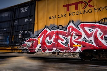 Shipping Container With Graffiti on Railway