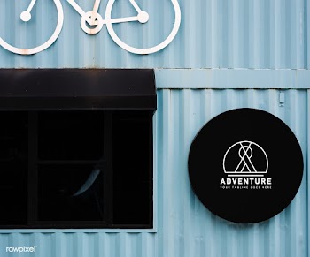 Shop front mockup with a decorative bicycle m.. | Free stock psd mockup - 534763