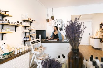 Shop Owner At Desk