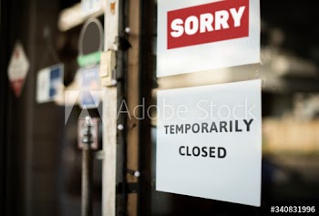 Shop temporarily closed sign during coronavirus pandemic