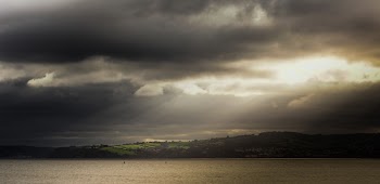 Shore Under Cloudy Sky