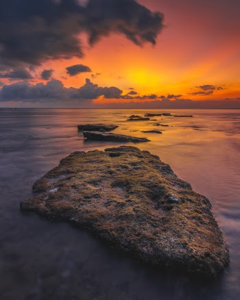 Shore With Rocks during Golden Hour