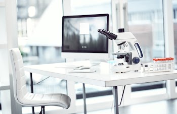 Shot of a desk with scientific equipment on it inside of a laboratory