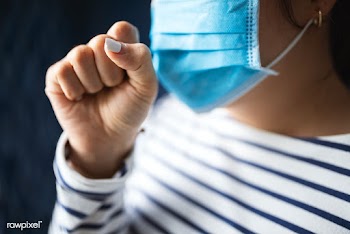 Sick woman in a mask coughing in public during coronavirus pandemic | Free  photo - 2292012