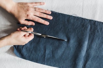 Sicssors Cutting Fabric Topdown