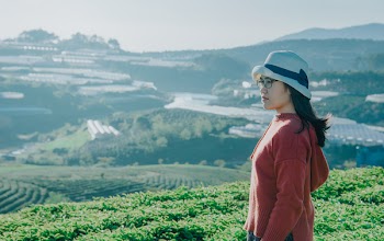 Side View of Woman on Top of the Mountain