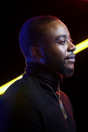 Side View Photo of Man Wearing Black Turtleneck Shirt
