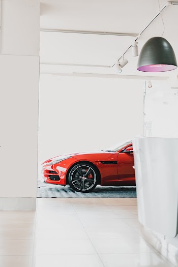 Side View Photo Of Red Car