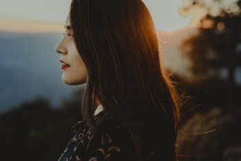 Side View Photo of Woman