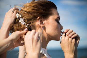 Side View Photo of Woman Closing Her Eyes