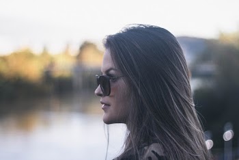 Side View Portrait Photo of Woman in Black Sunglasses