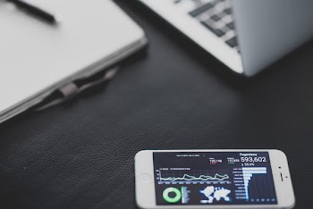 Side-View Smartphone Analytics &amp; Laptop