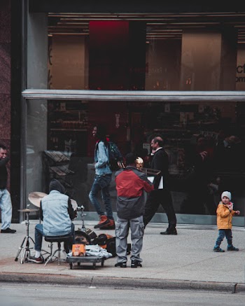 Sidewalk With Musicians