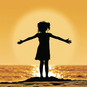 Silhouette of a Girl Embracing Sunset