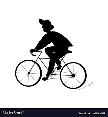 silhouette of a person riding a bicycle