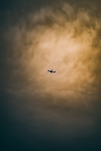Silhouette Of Airplane in the Sky