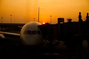 Silhouette of Airplane on Airport during Sunset
