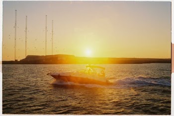 Silhouette of Boat on Sea during Sunset · Free Stock Photo