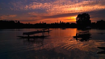 Silhouette of Boats on Lake
