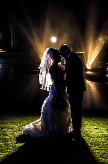 Silhouette of Bride and Groom on Grass Field during Night Times