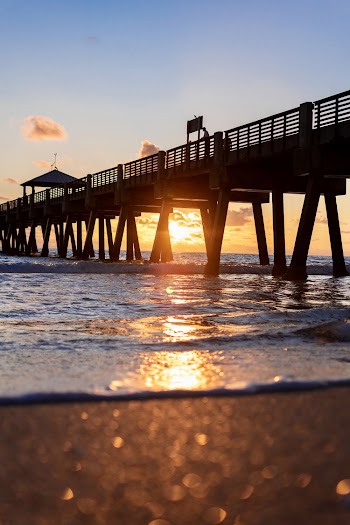 Silhouette Of Dock During Golden Hour