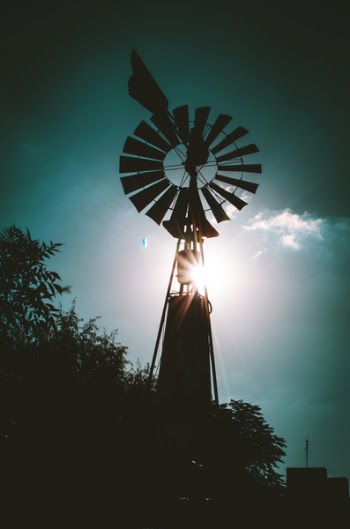 Silhouette of Farm Windmill