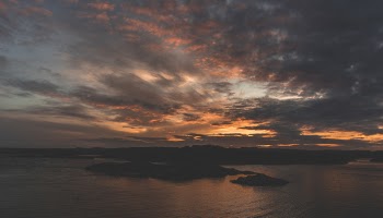 Silhouette of Island during Sunset