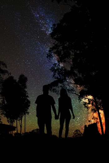 Silhouette of Man and Woman Holding Hands