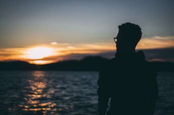 Silhouette of Man during Sunrise