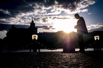 Silhouette of Man Near Body of Water