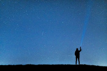 Silhouette Of Man Under Blue Sky During Nighttime